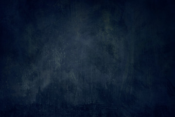 Dark blue grungy background or texture