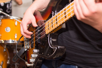 electric guitar close up in the hands of a guitarist