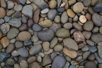 pebbles on the beach, stone background