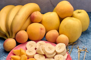 view of several ripe yellow and orange fruits