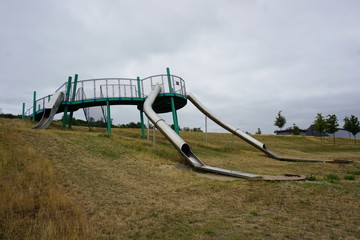 DINSLAKEN, Germany - 15/07/2019: Playground At "Bergpark Lohberg" On A Cloudy Day