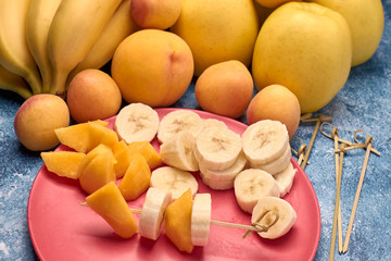 view of several ripe yellow and orange fruits