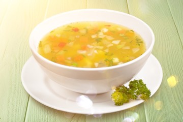 Bowl of delicious vegetables soup on  table
