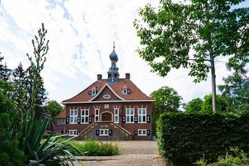 Fototapeta na wymiar town hall in Maarn, The Netherlands
