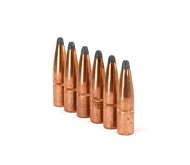 A rifle bullet. Hunting ammunition isolated on white.