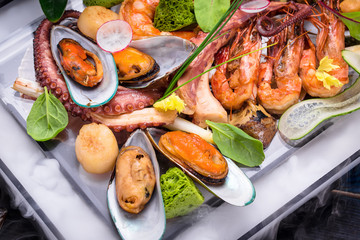 dish of seafood set on wooden table