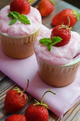 Delicious strawberry pudding in a ceramic Cup and fresh strawberries.Healthy diet.