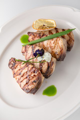 Grilled fish fillet: dorada, cod, halibut, pollock, tilapia. Seafood. Banquet festive dishes. Fine dining restaurant menu. White background.
