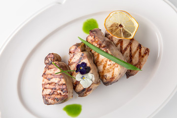 Grilled fish fillet: dorada, cod, halibut, pollock, tilapia. Seafood. Banquet festive dishes. Fine dining restaurant menu. White background.