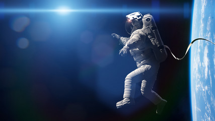 astronaut performing a spacewalk in orbit of planet Earth © dottedyeti