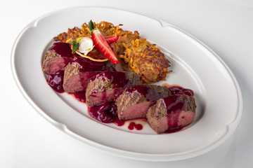 Filet mignon Beef, or Pork. Grilled young calf tenderloin with berries, mashed potatoes. Banquet festive dishes. Fine dining restaurant menu. White background. 