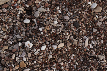 lot of small pebbles on the beach
