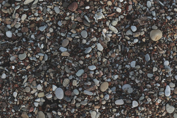 lot of small pebbles on the beach