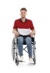 Handsome young man in wheelchair isolated on white