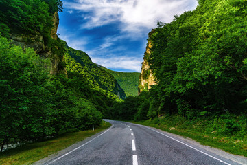 Road in the mountains, Caucasus mountains, sunny day