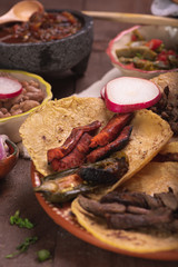 Fototapeta na wymiar Tacos de Mexico, tacos carne asada, tacos de arrachera, tacos de al pastor, cultura mexicana