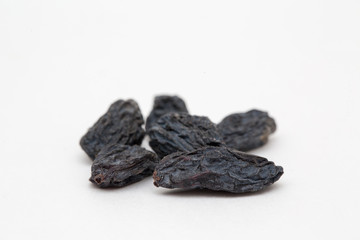 Raisin closeup isolated on white background