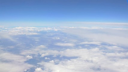 Aerial shot above the clouds in 4K