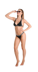 Pretty sexy woman in stylish bikini with sunglasses on white background