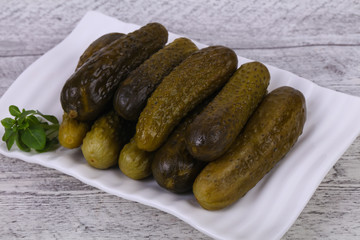 Pickled cucumbers heap in the bowl