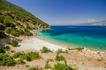 Fototapeta premium Vouti beach, Kefalonia island, Greece. People relaxing at the beach. 