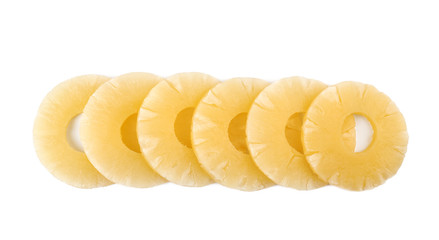 Slices of delicious sweet canned pineapple on white background, top view