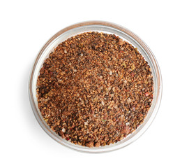 Bowl of ground pepper isolated on white, top view