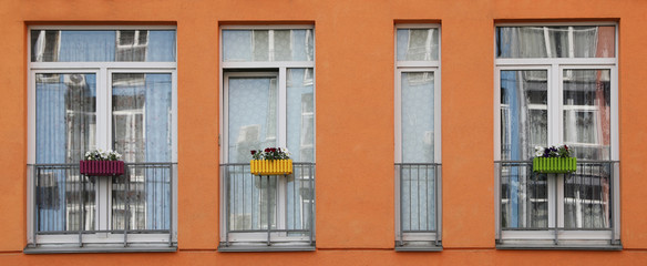 Obraz premium Colorful modern building with windows. Urban architecture