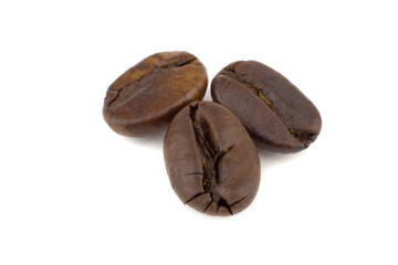 Roasted coffee beans. Isolated on a white background.