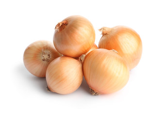 Fresh ripe onion bulbs on white background