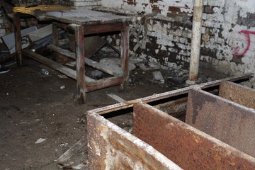 Fototapeta na wymiar Furniture in abandoned building
