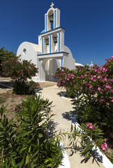 A typical blue domed church situated at Exo Gonia on the Greek island of Santorini.