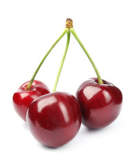 Fototapeta na wymiar Delicious ripe sweet cherries on white background
