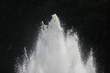 Top of a fountain, frozen single waterdrops. 