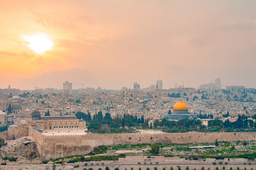 Fototapeta premium Panoramic view of Jerusalem old city and the Temple Mount during a dramatic colorful sunset