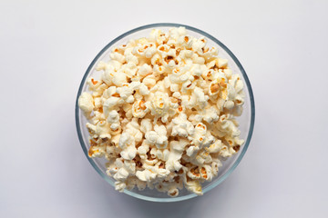popcorn in a bowl isolated on white