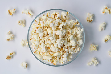popcorn in a bowl on white background
