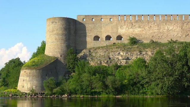 View of beautiful landscape with Ivangorod fortress across the Narva river.