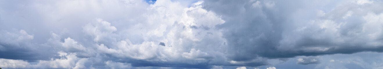 Clouds against the blue sky. Atmospheric phenomenon-vaporization, visible to the naked eye, panorama.