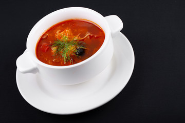 tomato soup in a bowl isolated on white