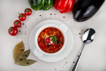 tomato soup in white bowl