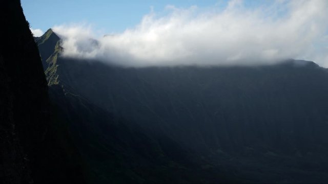 Timelipse of Stratus Clouds Hitting Peaks of Nuuanu Pali Ridges on Oahu Island Hawaii, View From Pali Notches.