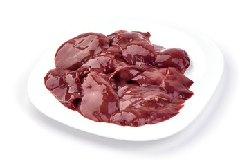 Raw Chicken livers on a plate, ingredients for cooking, close-up, isolated on white background