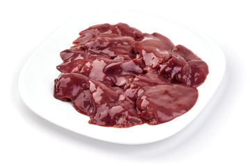 Raw Chicken livers on a plate, ingredients for cooking, close-up, isolated on white background