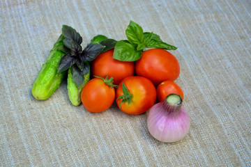 Fresh vegetables. Tomatoes, basil, cucumbers, onions. Food