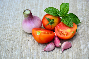  Fresh vegetables. Tomatoes, basil, garlic, onion. Food
