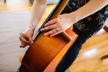 a tuning fork on a cello