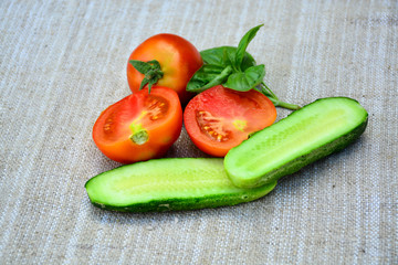  Fresh vegetables. Tomatoes, cucumber basil. Food