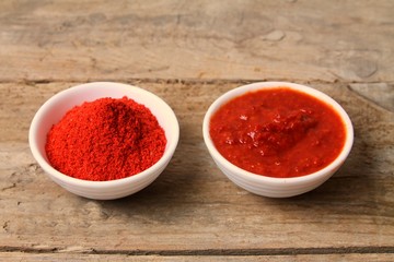 Traditional Maghrebi food: hot chili pepper powder and sauce paste harissa. Tunisia and Arabic cuisine adjika
