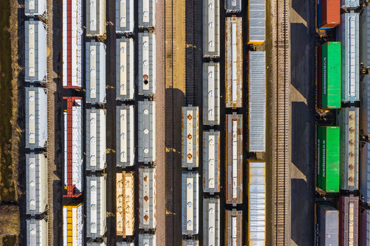 Aerial view of rail cars waiting at a staging railyard station in Aurora, IL - USA